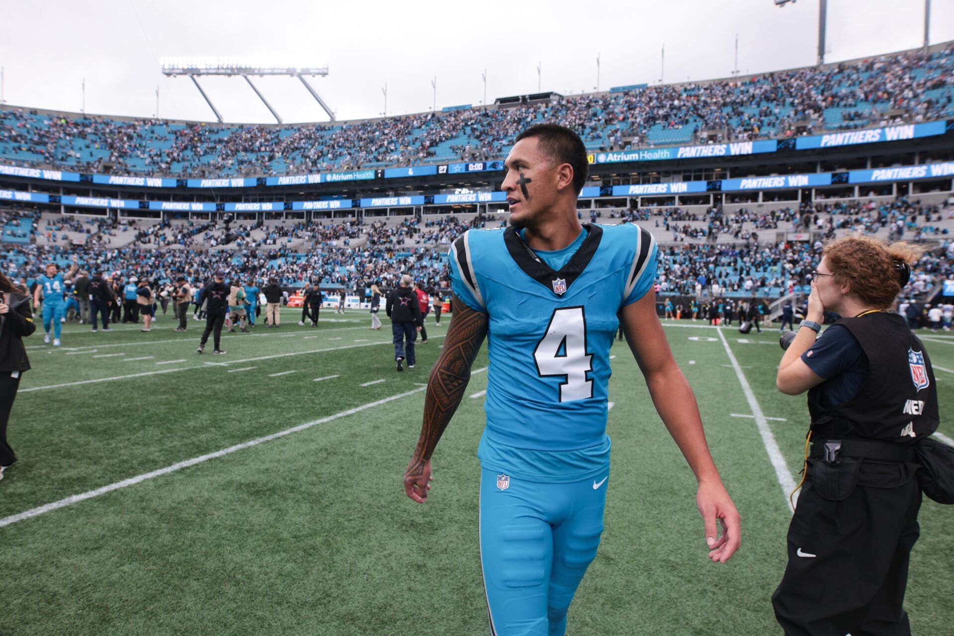 Carolina Panthers wide receiver Tetairoa McMillan (4) looks on after the game against the Dallas Cowboys at Bank of America Stadium.