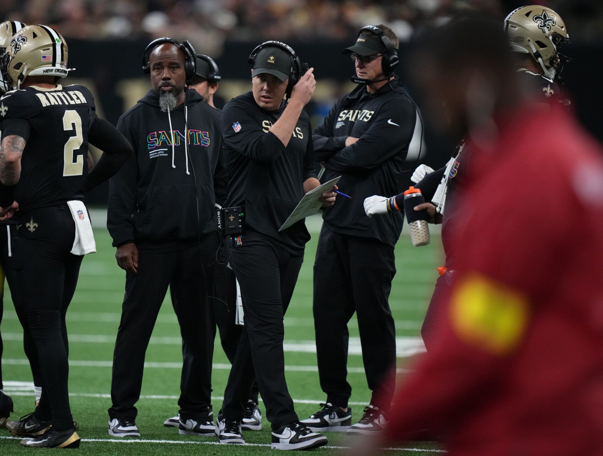 New Orleans Saints head coach Kellen Moore on the field during the second quarter against the New England Patriots at Caesars Superdome.
