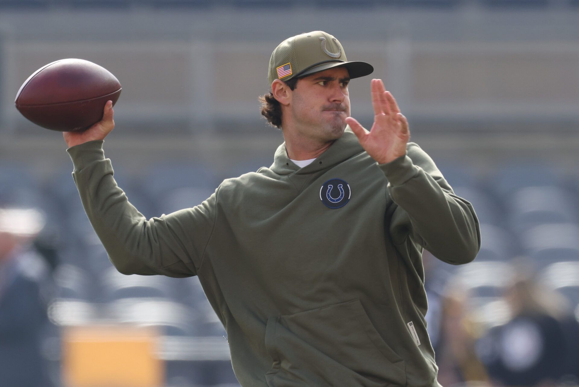 Indianapolis Colts quarterback Daniel Jones (17) warms up before the game against the Pittsburgh Steelers at Acrisure Stadium.