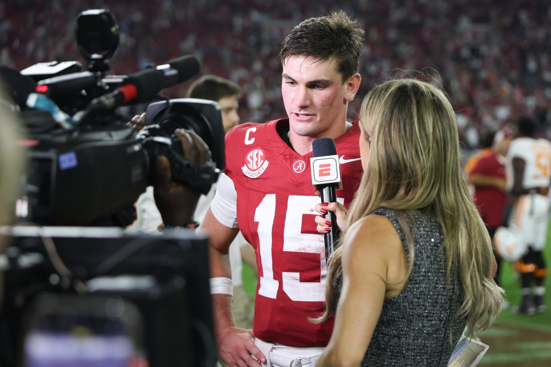 Alabama Crimson Tide quarterback Ty Simpson (15) is interviewed after the game against the Tennessee Volunteers at Saban Field at Bryant-Denny Stadium.
