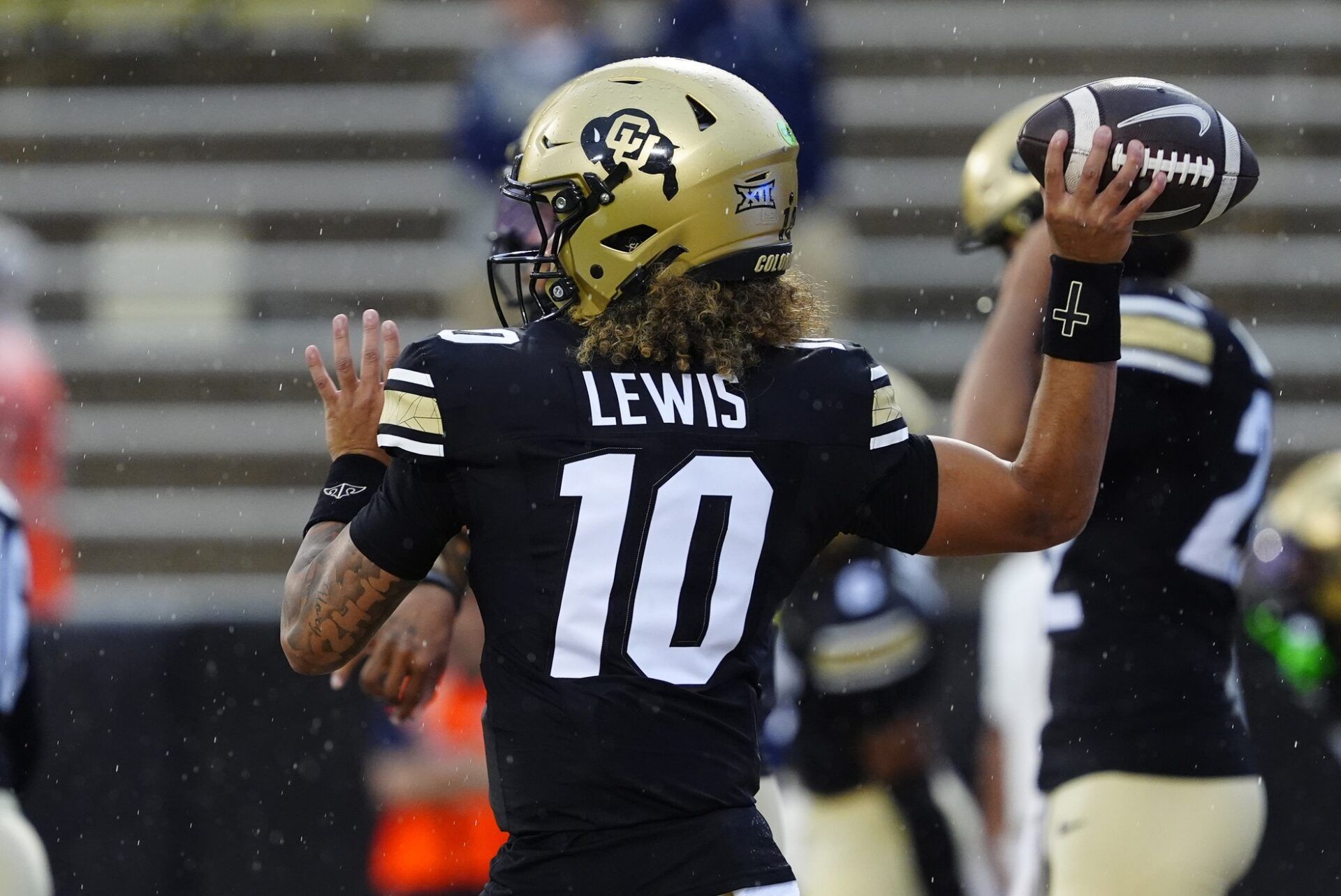 Colorado Buffaloes quarterback Julian Lewis (10) before the game against the Georgia Tech Yellow Jackets at Folsom Field.