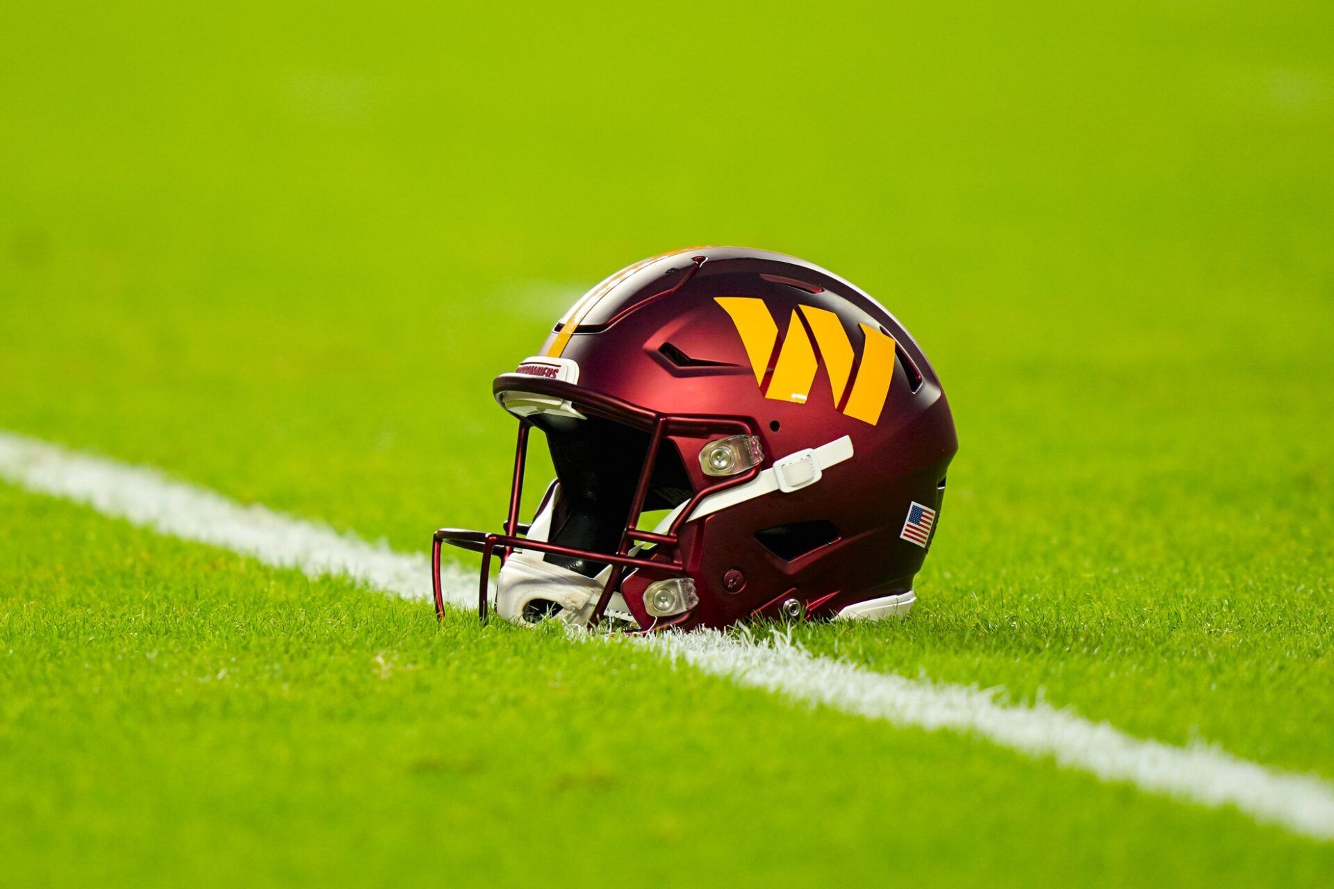A general view of a Washington Commanders helmet on the field prior to a game against the Kansas City Chiefs at GEHA Field at Arrowhead Stadium.