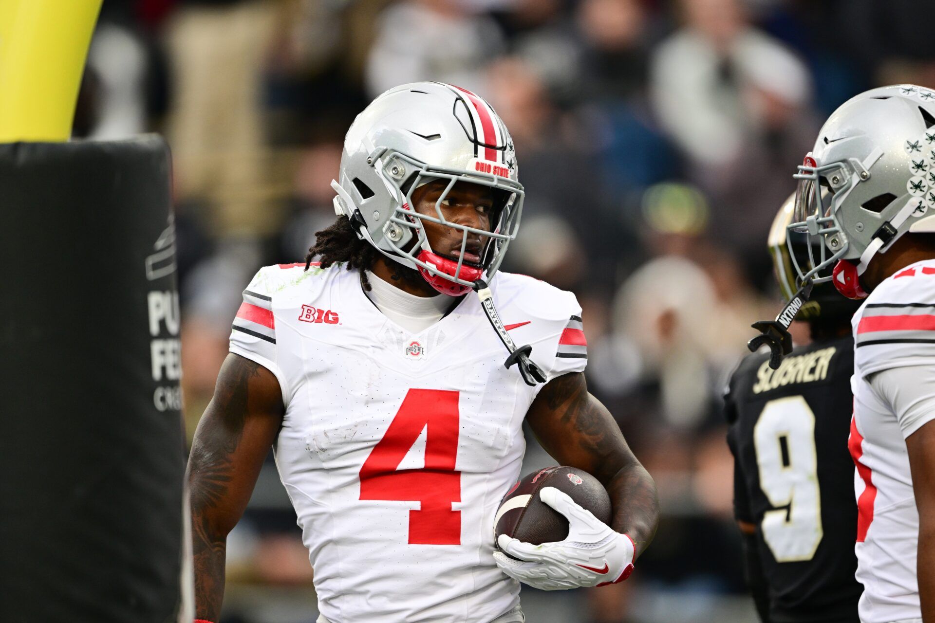 Ohio State Buckeyes wide receiver Jeremiah Smith (4) celebrates after scoring a touchdown during the second quarter against the Purdue Boilermakers at Ross-Ade Stadium.