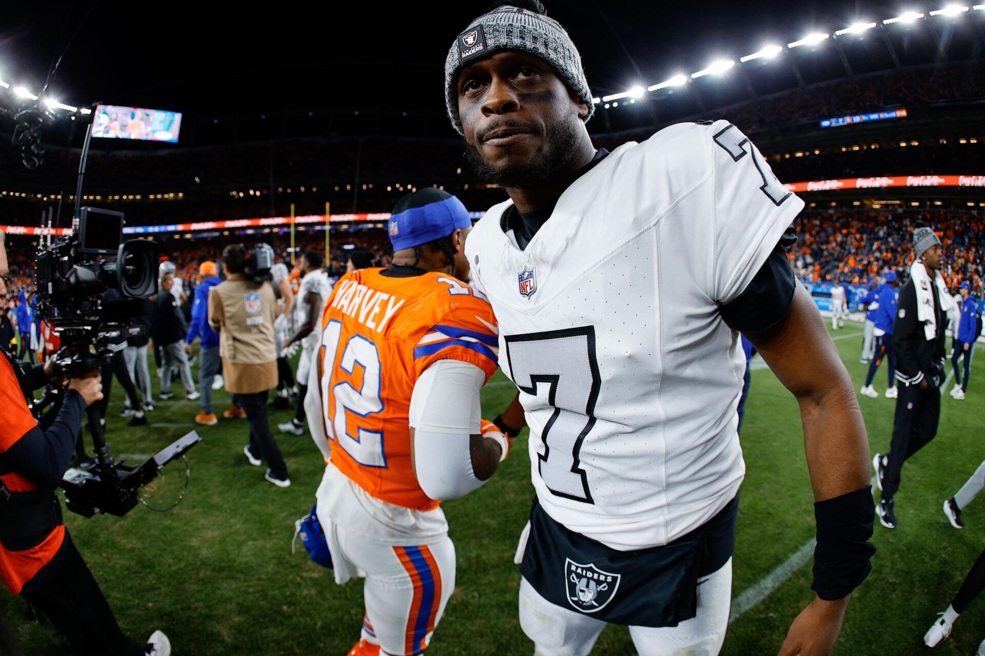 Las Vegas Raiders quarterback Geno Smith (7) after the game against the Denver Broncos at Empower Field at Mile High.