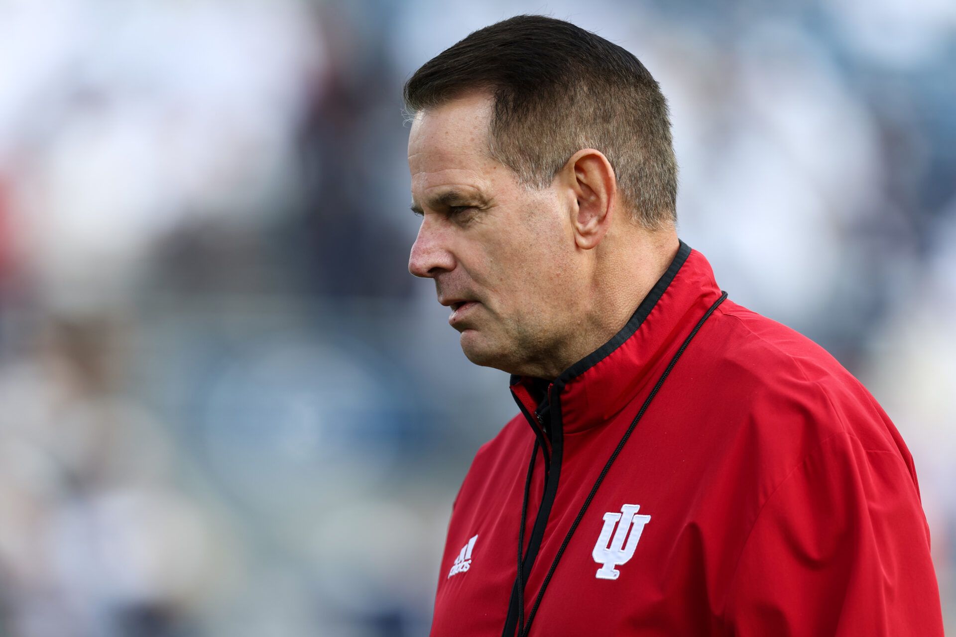Indiana Hoosiers head coach Curt Cignetti walks on the field prior to the game against the Penn State Nittany Lions at Beaver Stadium.