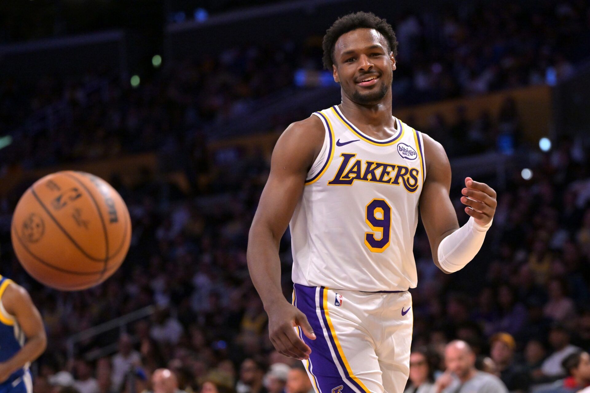 Los Angeles Lakers guard Bronny James (9) reacts after a Golden State Warriors basket during the second half at Crypto.com Arena.