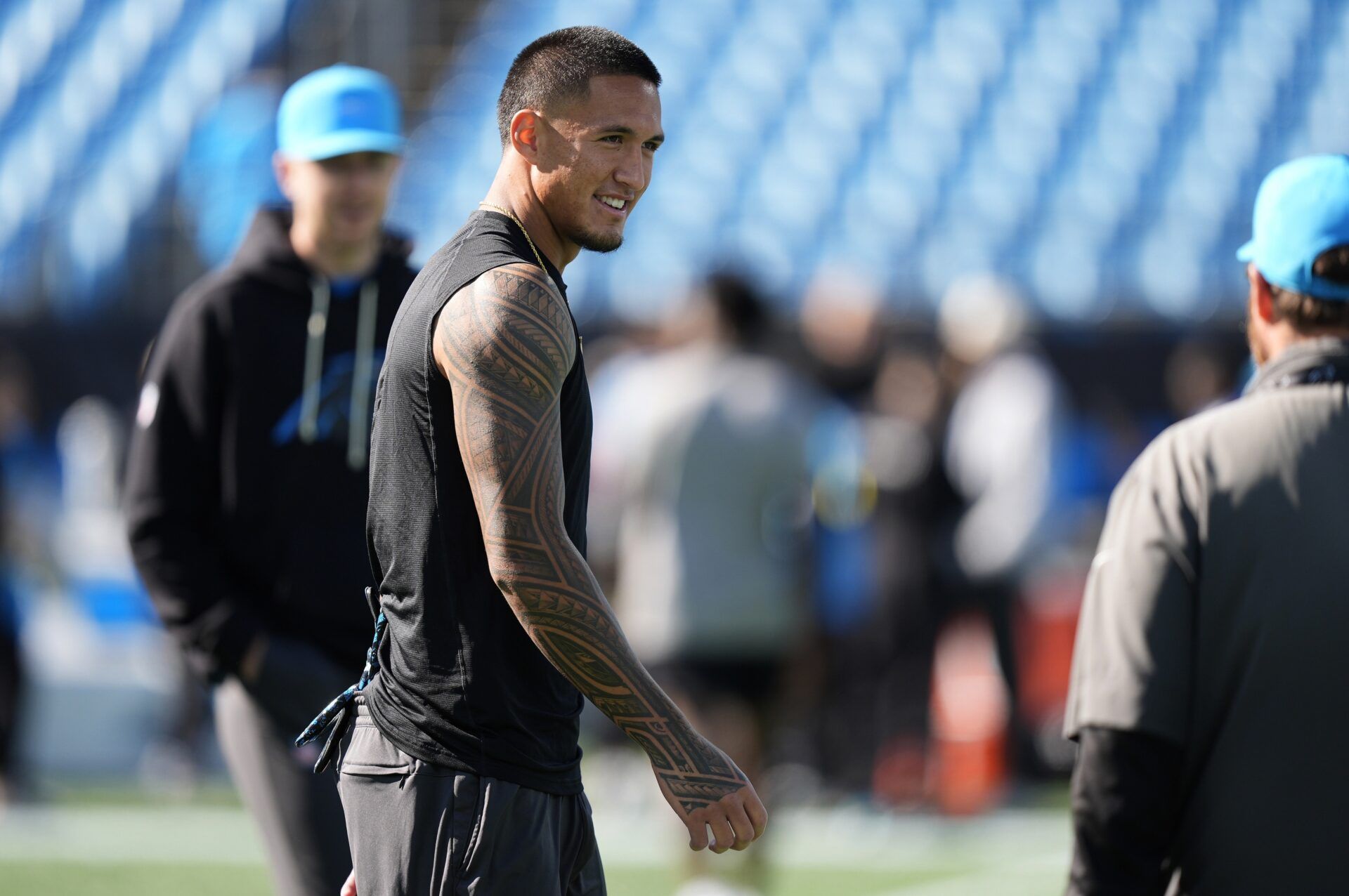 Carolina Panthers wide receiver Tetairoa McMillan (4) warms up before a game against the Buffalo Bills at Bank of America Stadium.