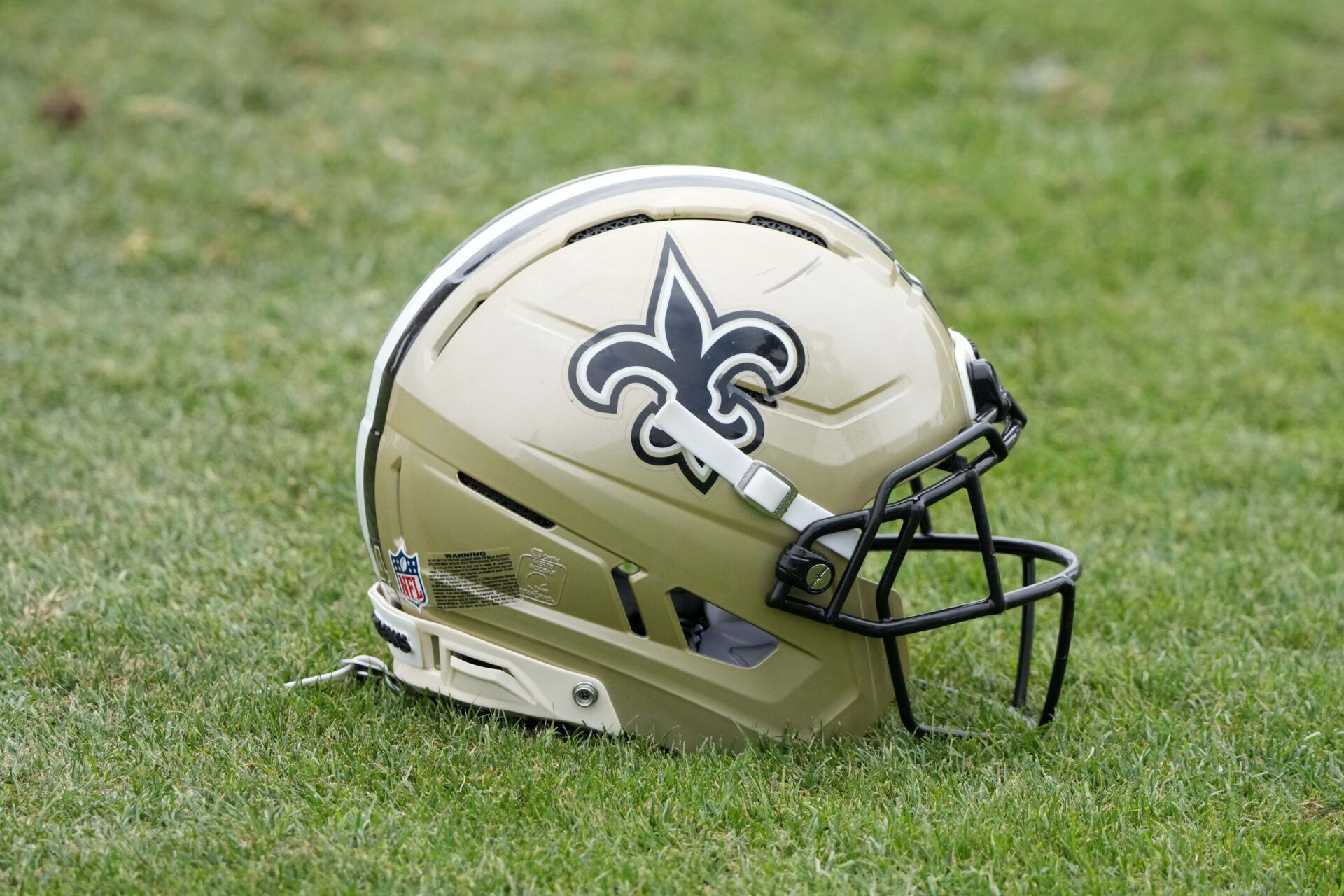 A New Orleans Saints helmet on the field during a joint practice against the Los Angeles Rams at the Dignity Health Sports Park.