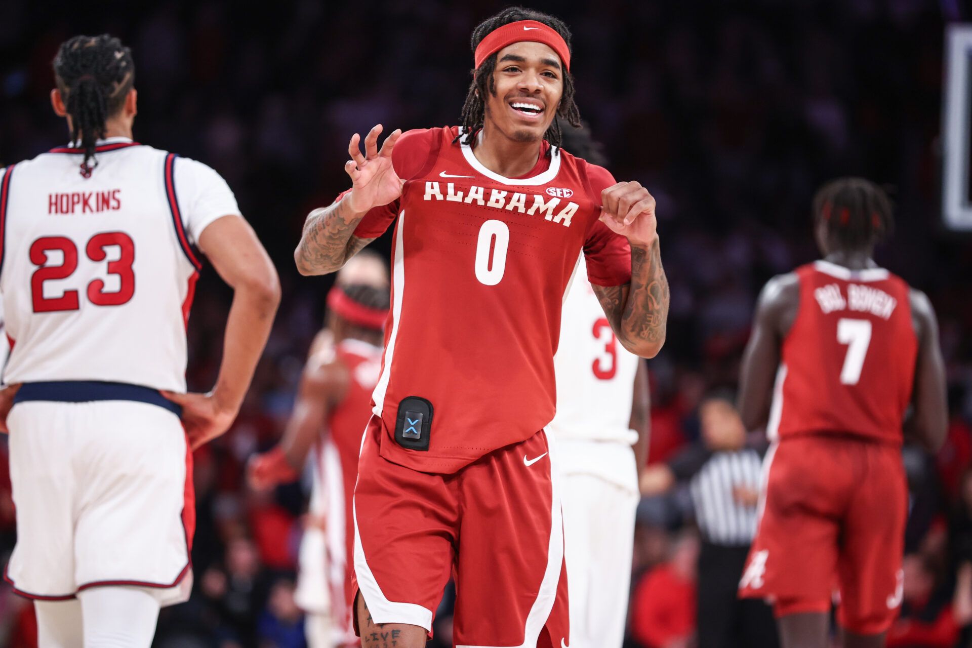 Alabama Crimson Tide guard Labaron Philon (0) celebrates in the second half against the St. John's Red Storm at Madison Square Garden.