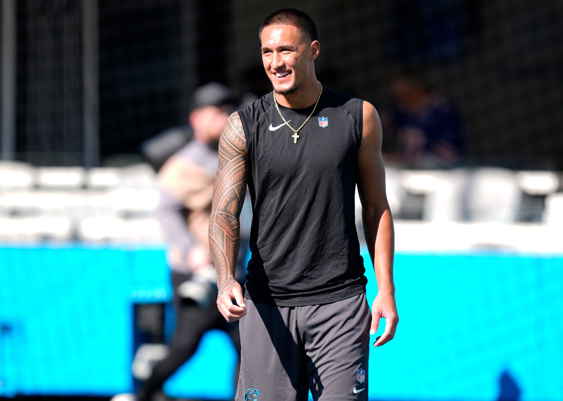 Carolina Panthers wide receiver Tetairoa McMillan (4) warms up before a game against the Buffalo Bills at Bank of America Stadium.