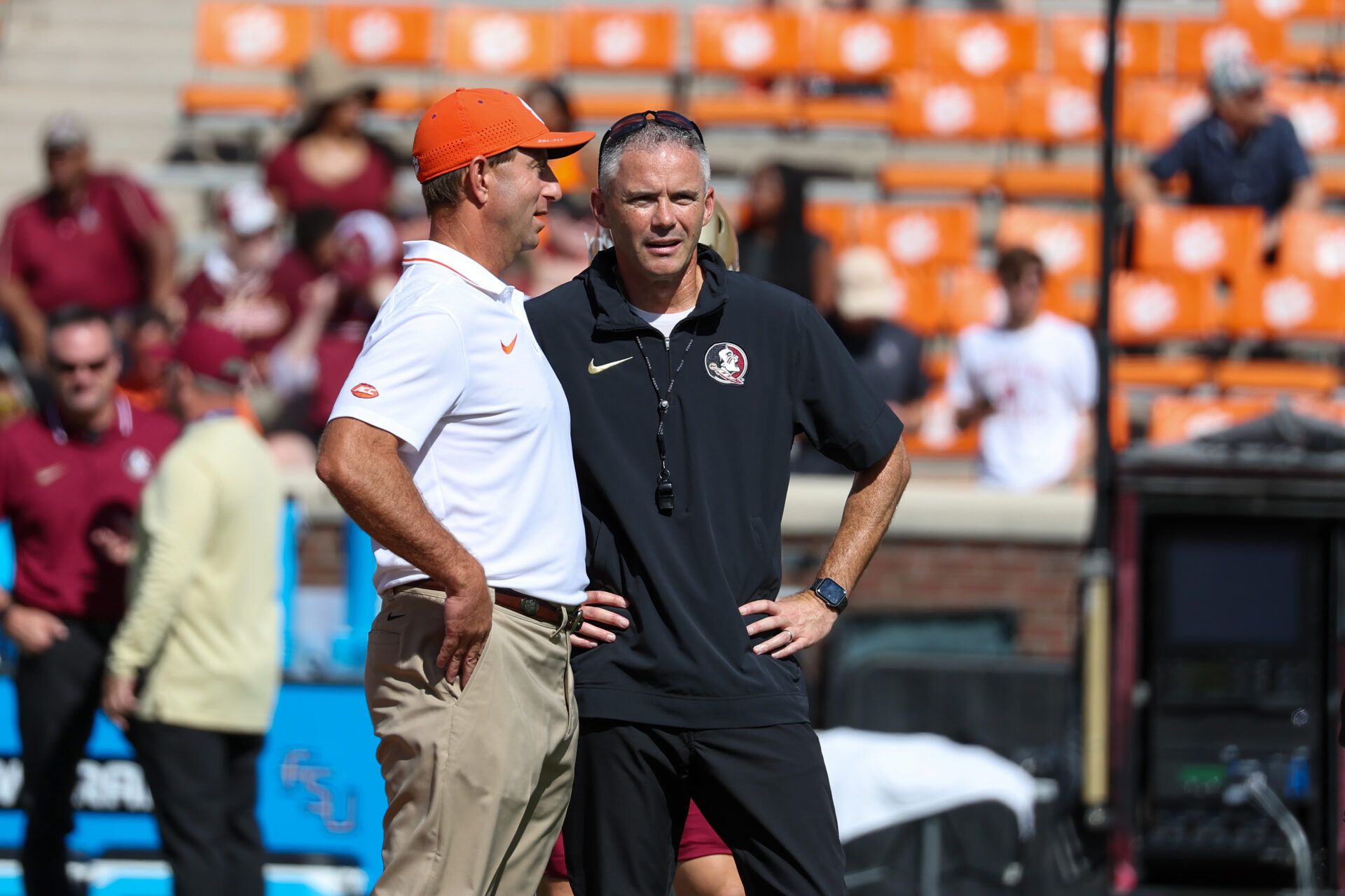 Clemson Tigers head coach Dabo Swinney (left) talks with Florida State Seminoles head coach Mike Norvell at Memorial Stadium.