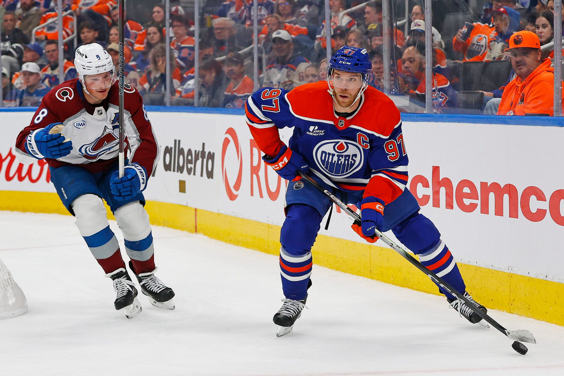 Edmonton Oilers forward Connor McDavid (97) looks to make a pass in front og Colorado Avalanche defensemen Cale Makar (8) during the third period at Rogers Place.