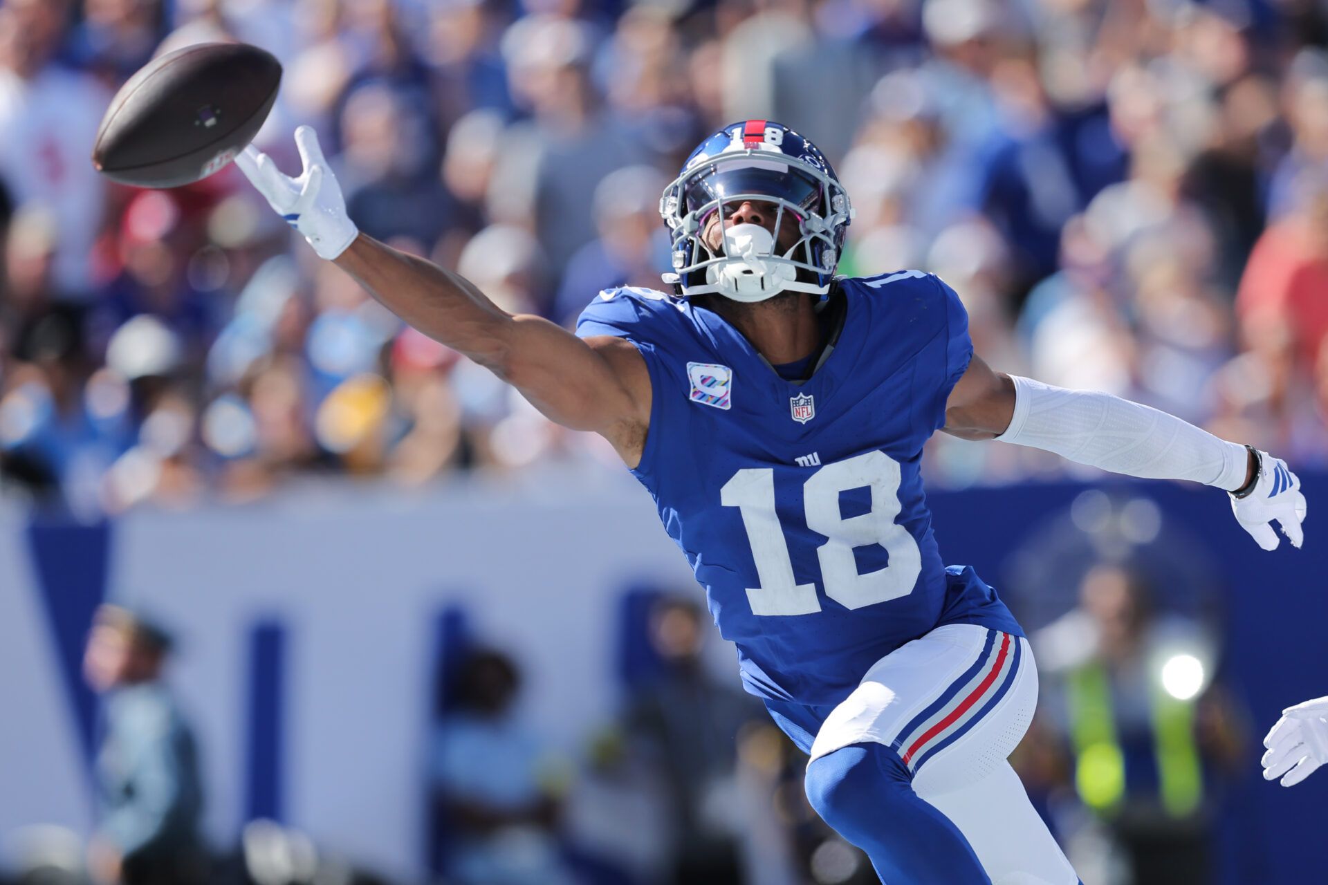 New York Giants wide receiver Darius Slayton (18) attempts to make a catch during the second quarter against the Los Angeles Chargers at MetLife Stadium.
