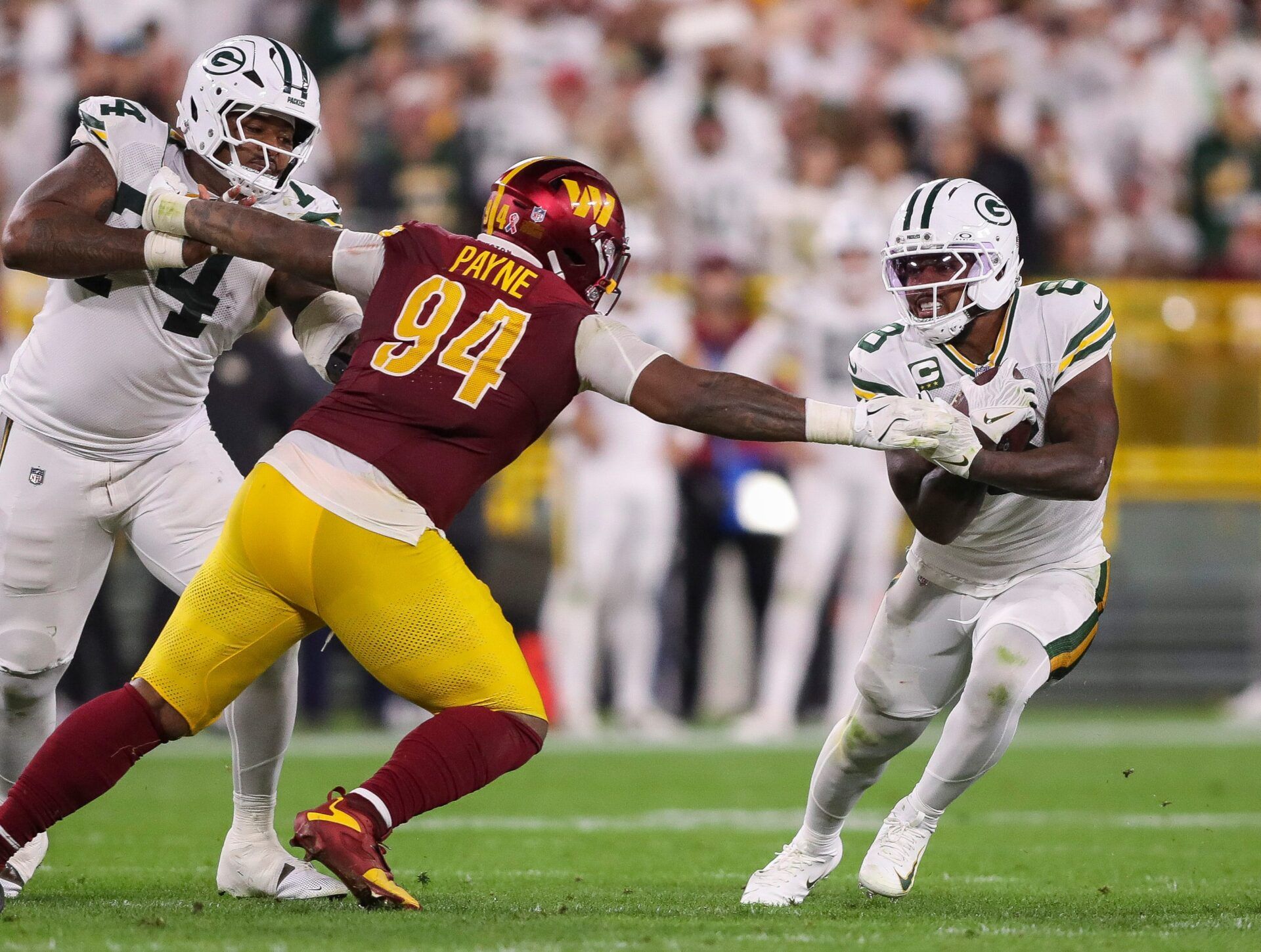 Green Bay Packers running back Josh Jacobs (8) runs the ball past Washington Commanders defensive tackle Daron Payne (94) on Thursday, September 11, 2025, at Lambeau Field in Green Bay, Wis. The Packers won the game, 27-18.
Tork Mason/USA TODAY NETWORK-Wisconsin