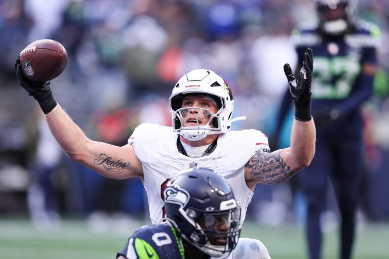 Arizona Cardinals tight end Trey McBride (85) celebrates after scoring a touchdown during the third quarter against the Seattle Seahawks at Lumen Field.