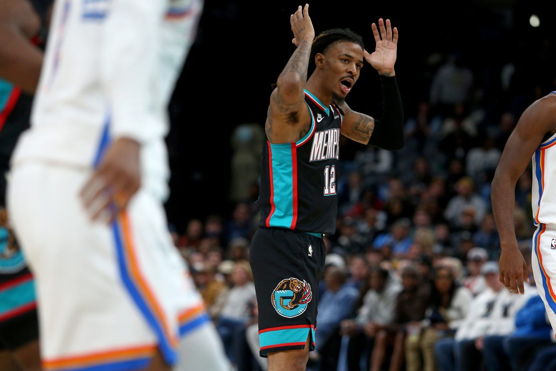 Memphis Grizzlies guard Ja Morant (12) reacts during the fourth quarter against the Oklahoma City Thunder at FedExForum.