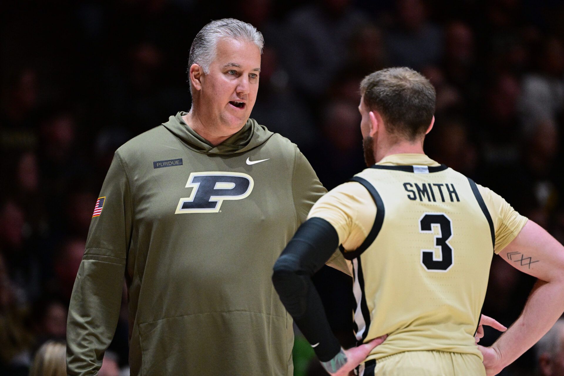 Purdue Boilermakers head coach Matt Painter talks with guard Braden Smith (3) during the first half against the Oakland Golden Grizzlies at Mackey Arena.