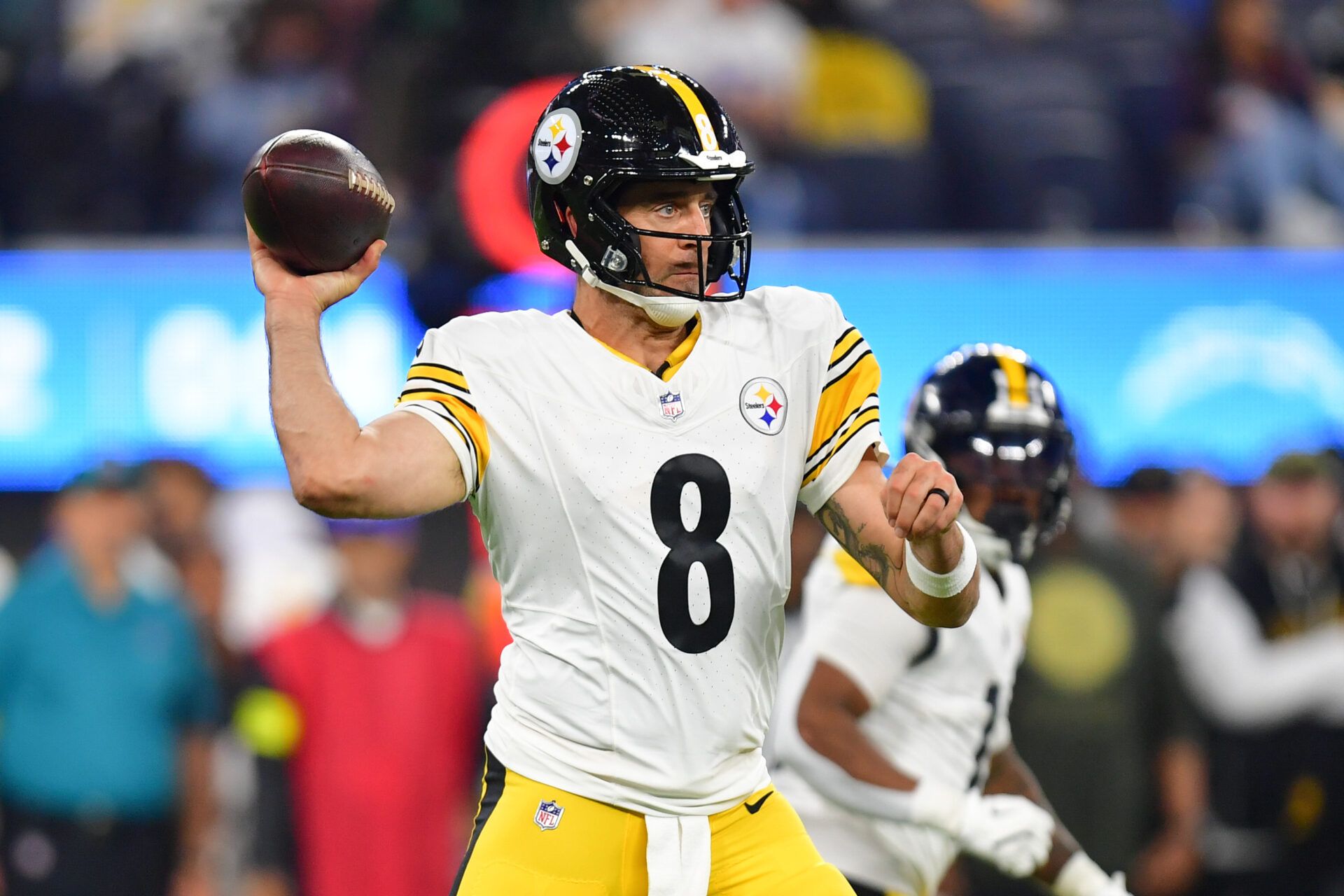 Pittsburgh Steelers quarterback Aaron Rodgers (8) passes the ball against the Los Angeles Chargers during the second quarter of the game at SoFi Stadium.