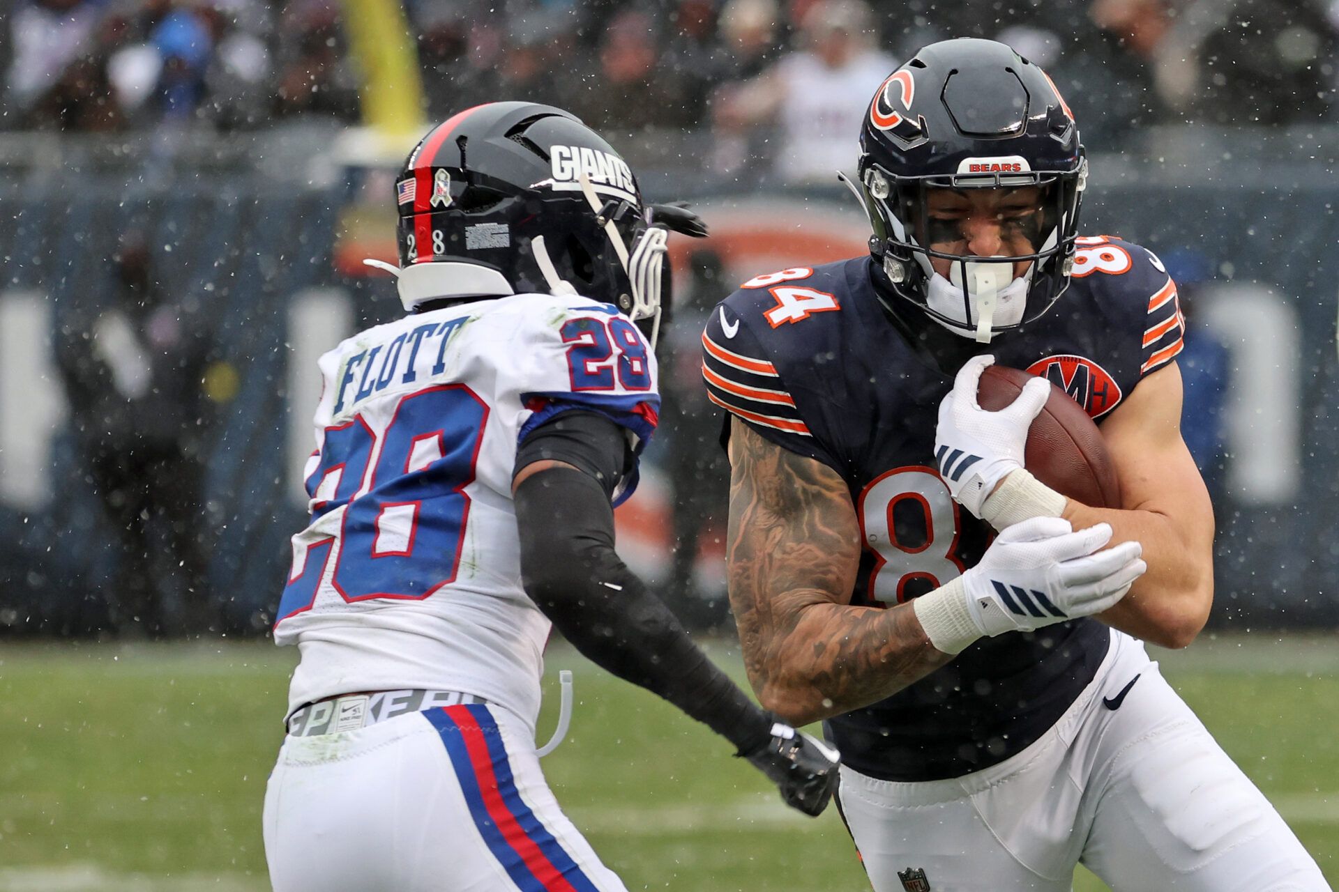 Chicago Bears tight end Colston Loveland (84) makes a catch over New York Giants cornerback Cordale Flott (28) during the second half at Soldier Field.
