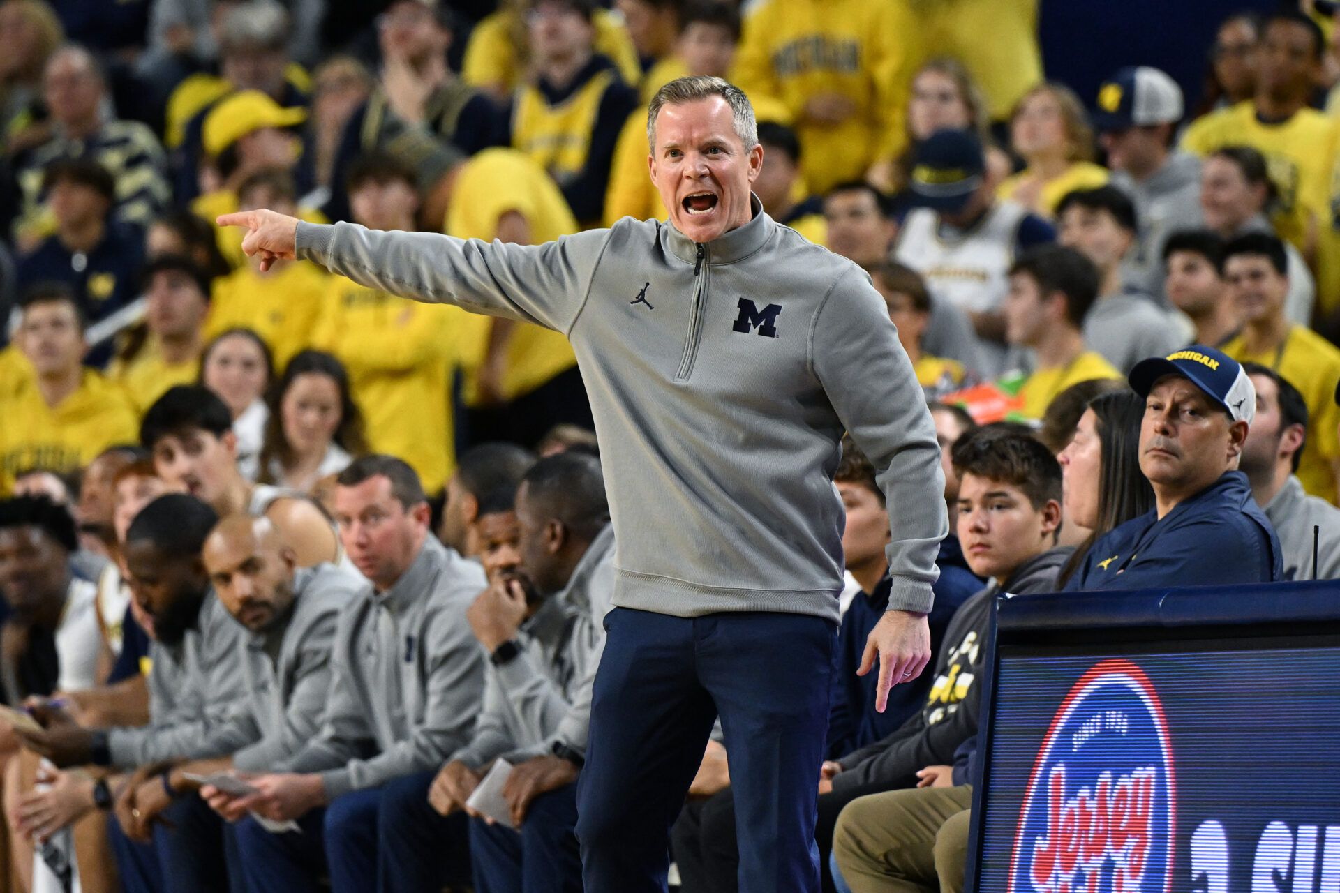 Michigan Wolverines head coach Dusty May yells during the first half against the Oakland Golden Grizzlies at Crisler Center.