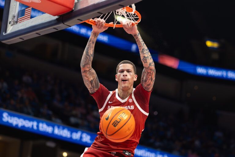 Arkansas Razorbacks forward Trevon Brazile (7) dunks the ball against the Memphis Tigers during the second half at FedEx Forum.