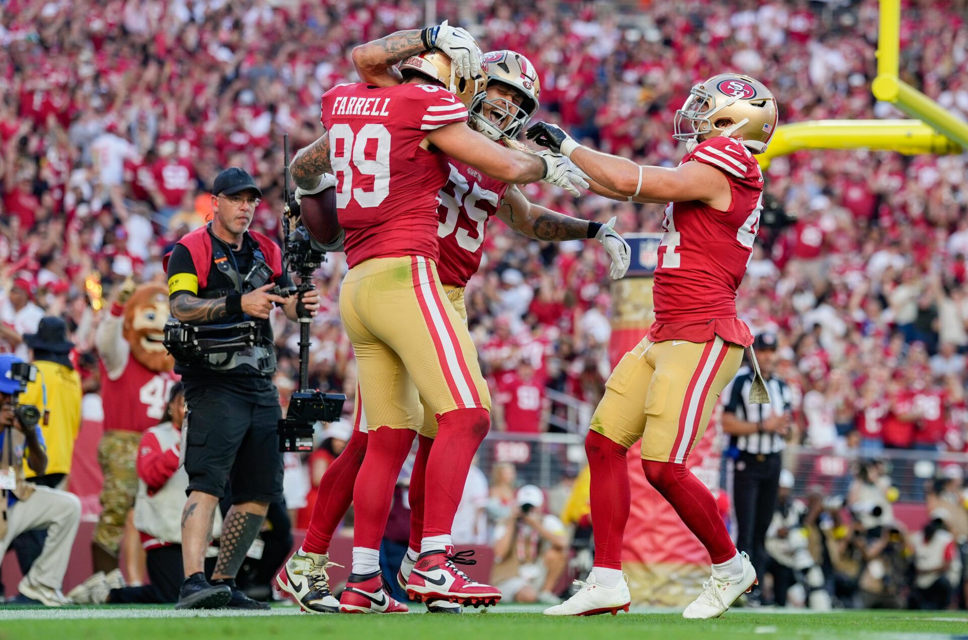 San Francisco 49ers tight end Luke Farrell (89) celebrates with San Francisco 49ers tight end George Kittle (85) and San Francisco 49ers fullback Kyle Juszczyk (44) after a touchdown during the fourth quarter against the Los Angeles Rams at Levi's Stadium.