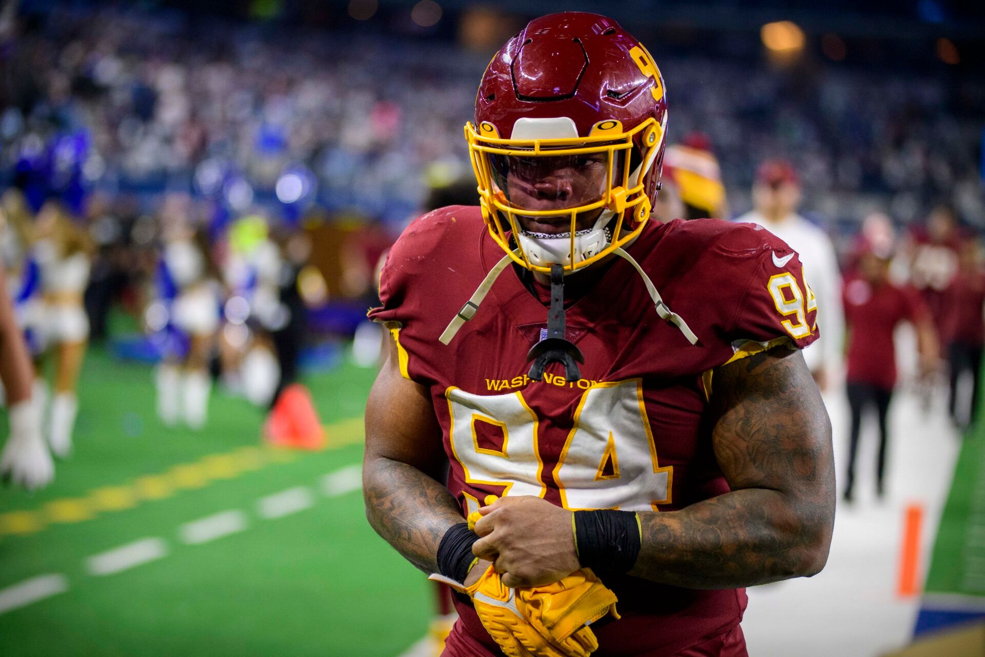 Washington Football Team defensive tackle Daron Payne (94) walks off the field after the loos to the Dallas Cowboys at AT&T Stadium.