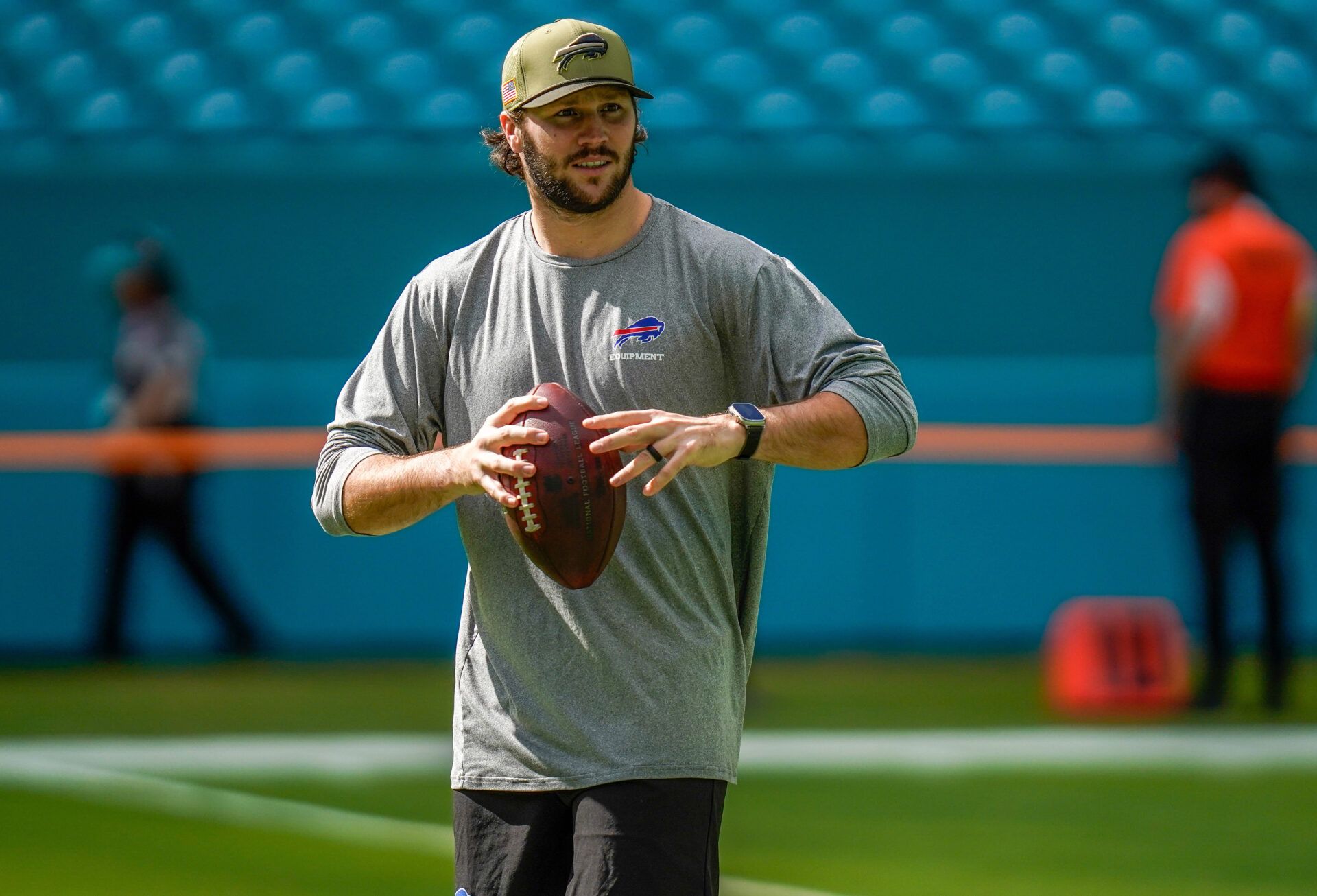 Buffalo Bills quarterback Josh Allen (17) warms up before a game against the Miami Dolphins at Hard Rock Stadium.