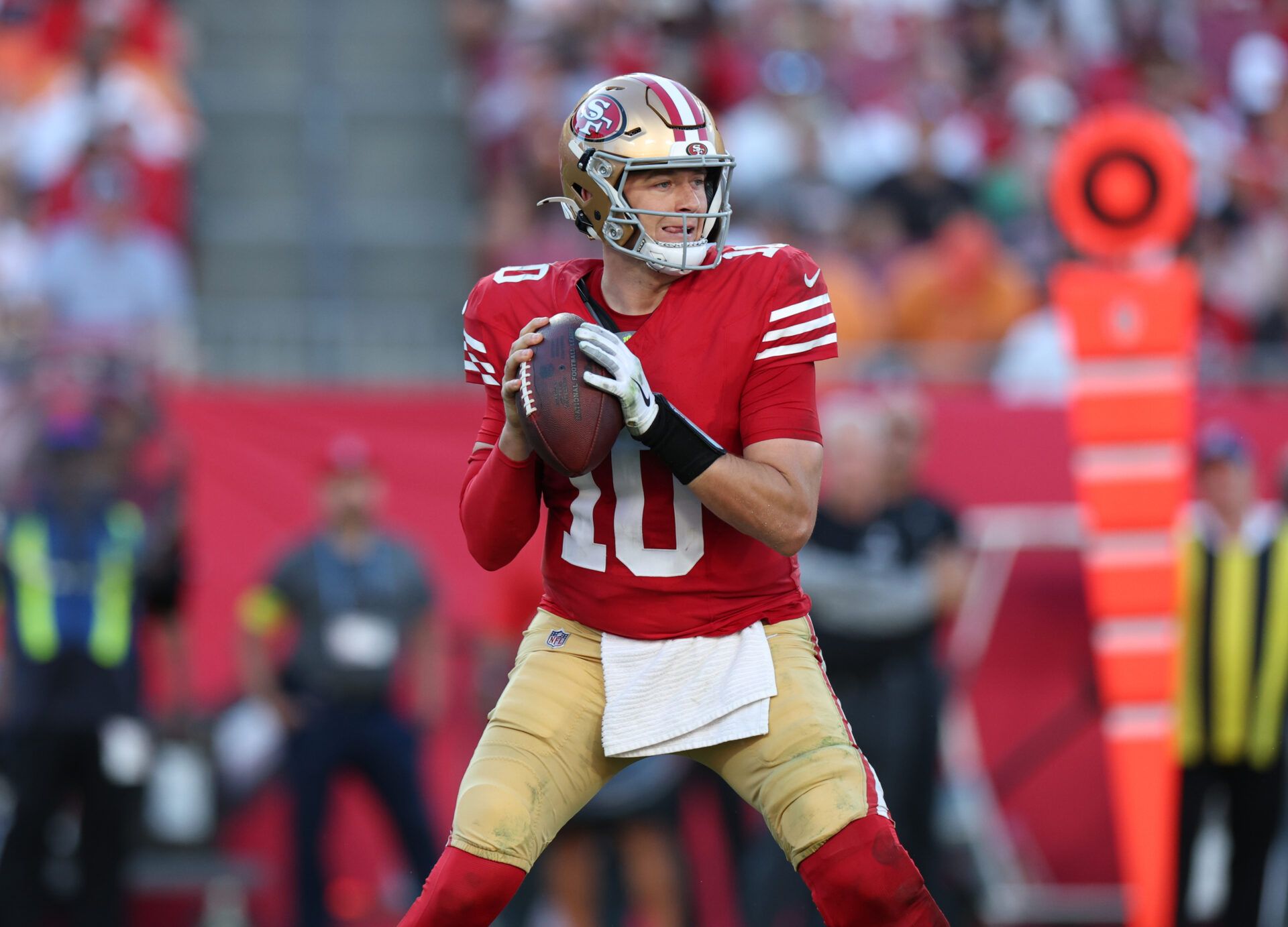 San Francisco 49ers quarterback Mac Jones (10) throws downfield during the third quarter against the Tampa Bay Buccaneers at Raymond James Stadium.