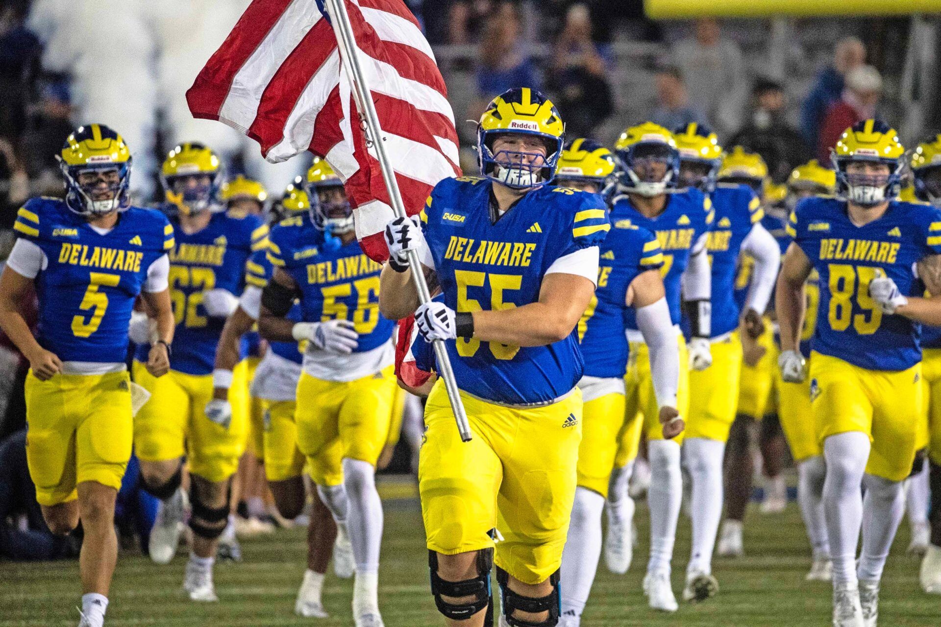 The Delaware Blue Hens take the field in front of a national TV audience for the start of its first home CUSA football game against Western Kentucky at Delaware Stadium in Newark on Oct. 3, 2025. The game is being nationally televised.