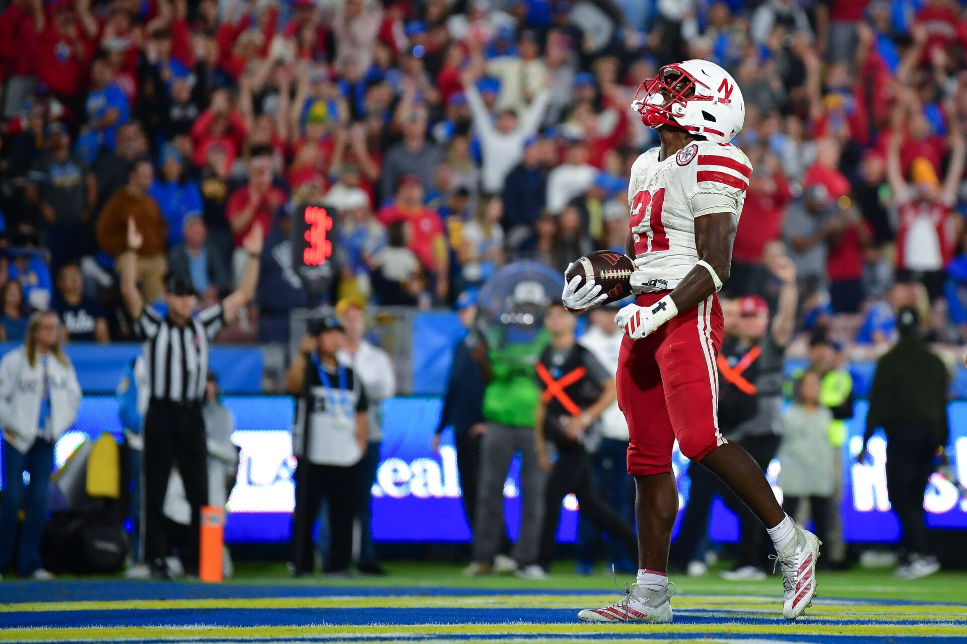 Nebraska Cornhuskers running back Emmett Johnson (21) celebrates his touchdown scored against the UCLA Bruins during the first half at the Rose Bowl.