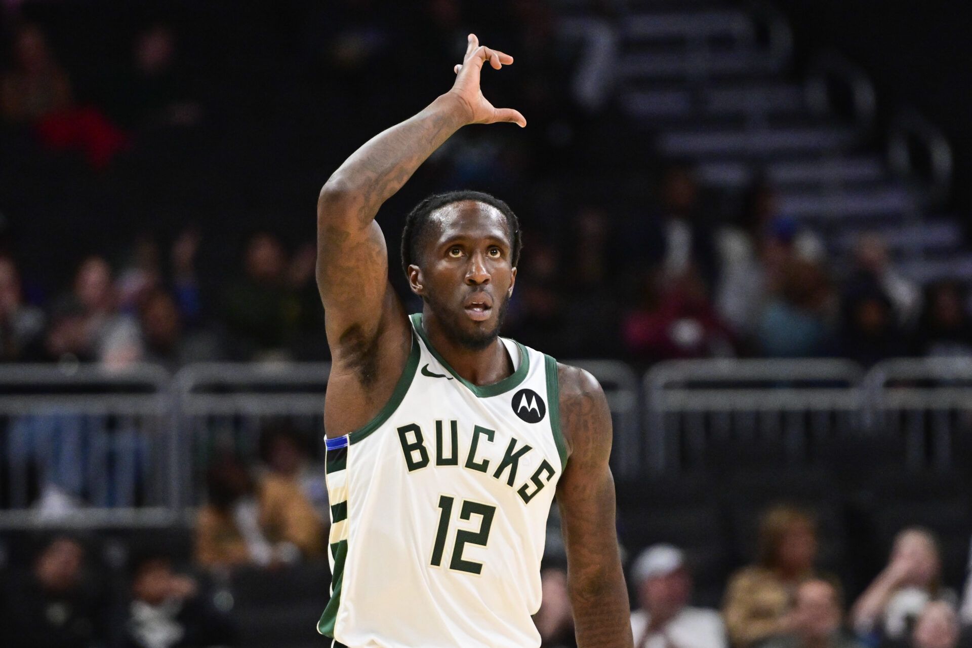 Milwaukee Bucks guard Taurean Prince (12) reacts after scoring a basket in the 3rd quarter against the Detroit Pistons at Fiserv Forum.