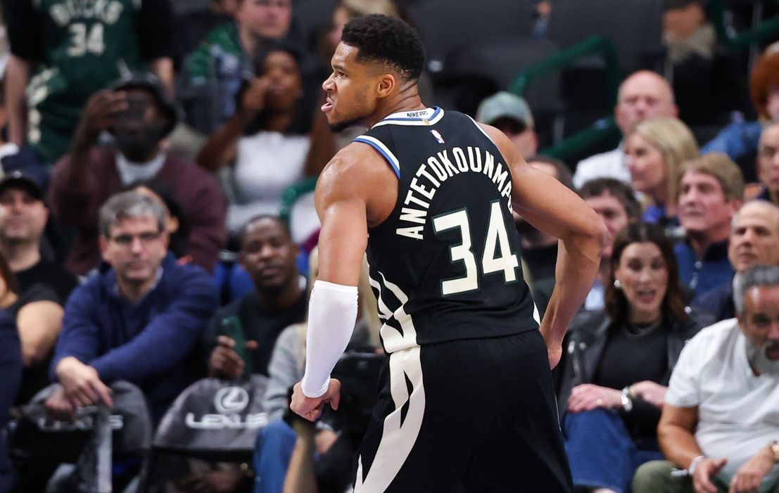 Milwaukee Bucks forward Giannis Antetokounmpo (34) reacts after scoring against the Dallas Mavericks during the fourth quarter at American Airlines Center.