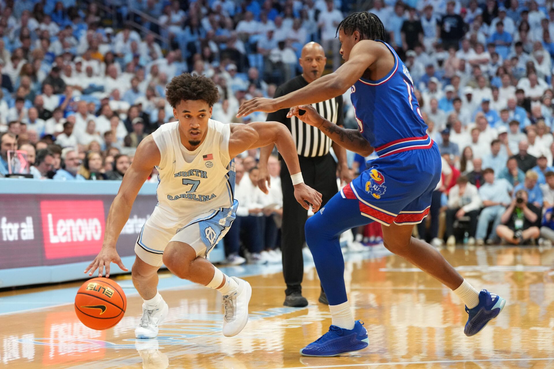 North Carolina Tar Heels guard Seth Trimble (7) with the ball as Kansas Jayhawks guard Elmarko Jackson (13) defends in the second half at Dean E. Smith Center.