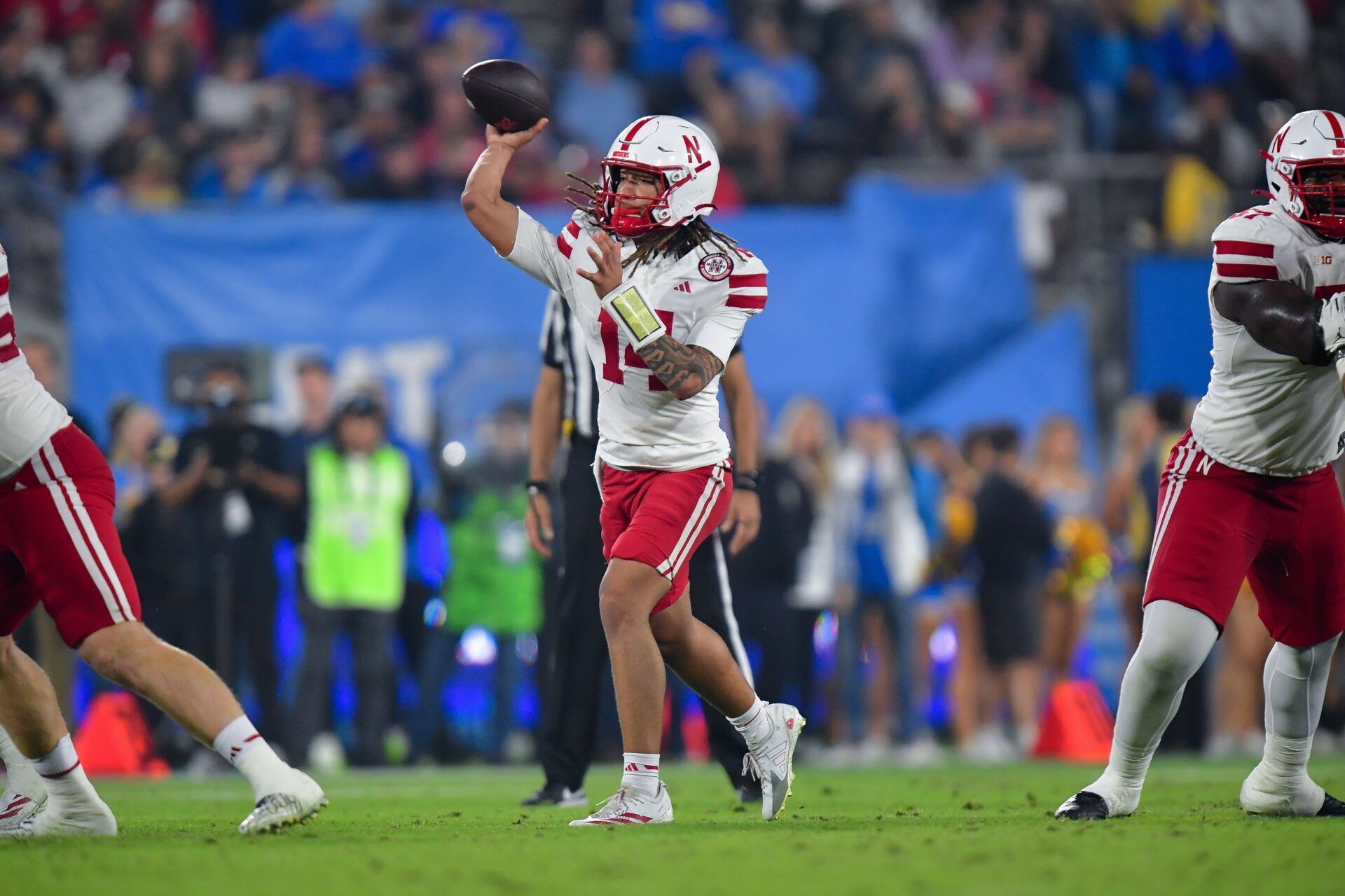 Nebraska Cornhuskers quarterback TJ Lateef (14) throws against the UCLA Bruins during the first half at the Rose Bowl.