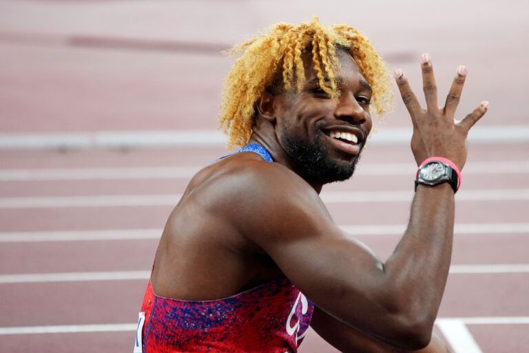 Noah Lyles (USA) celebrates winning the gold medal in the mens 200m during the World Athletics Championships at National Stadium.