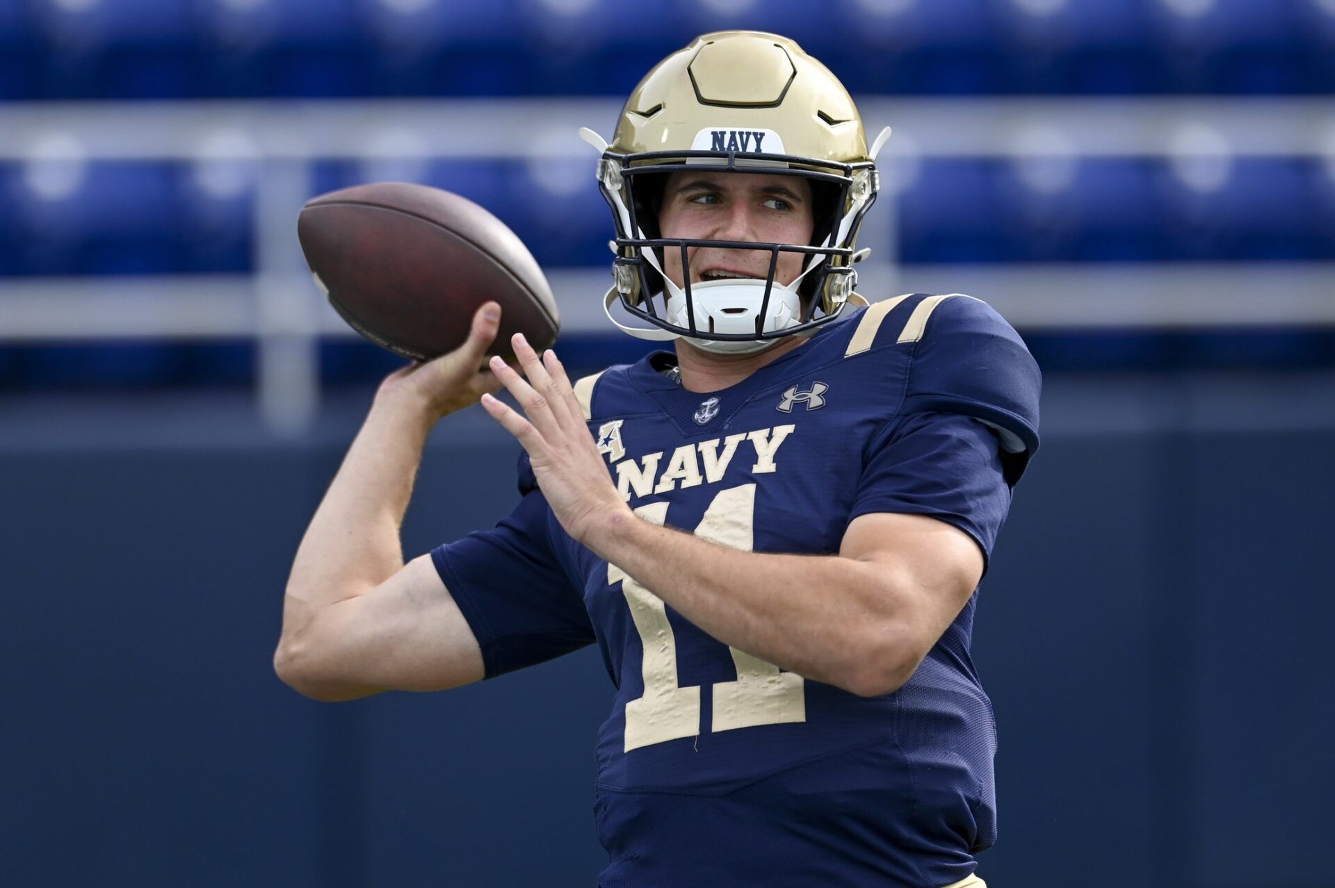 Navy Midshipmen quarterback Blake Horvath (11) throws before the game against the Florida Atlantic Owls at Navy-Marine Corps Memorial Stadium.