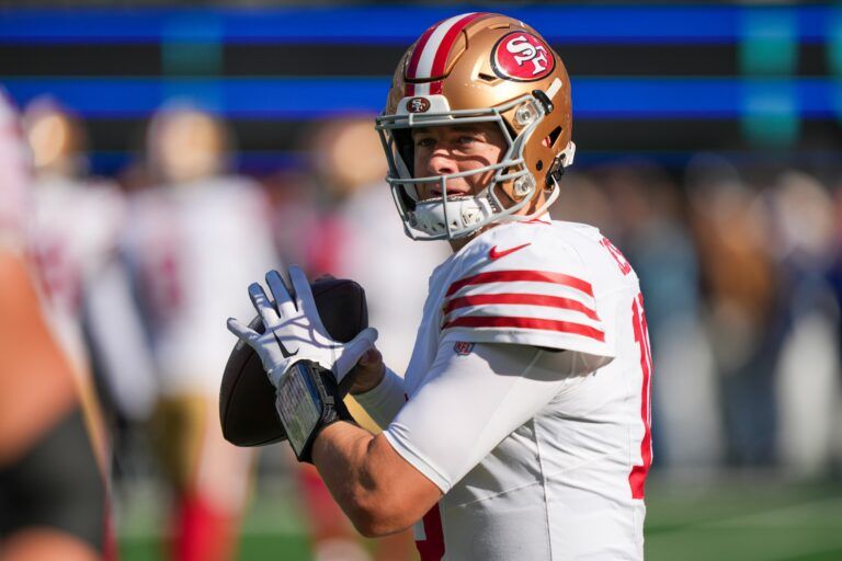 San Francisco 49ers quarterback Mac Jones (10) warms up prior to a game against the New York Giants at MetLife Stadium.