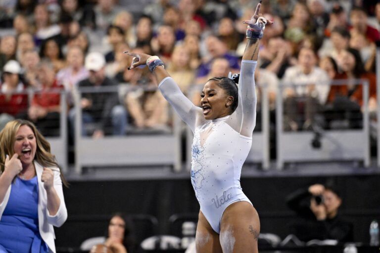 UCLA Bruins gymnast Jordan Chiles performs on uneven bars during the 2025 Women's National Gymnastics Championship at Dickies Arena.