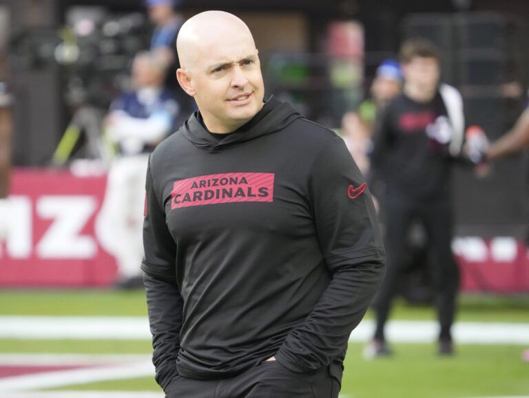 Arizona Cardinals offensive coordinator Drew Petzing watches his players warm up before playing against the Seattle Seahawks at State Farm Stadium in Glendale on Dec. 8, 2024.