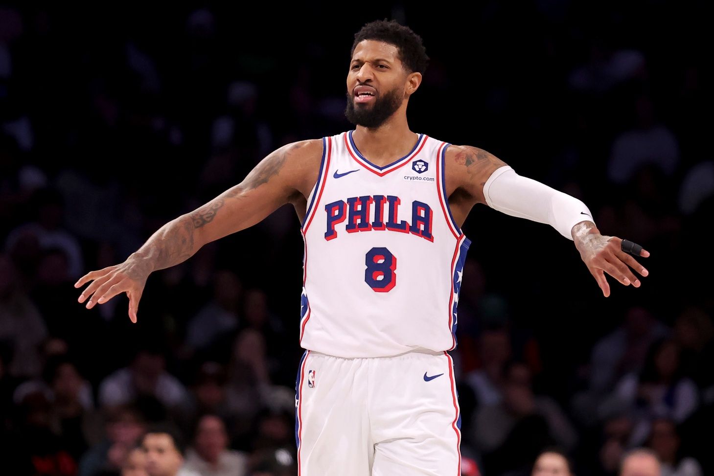 Philadelphia 76ers forward Paul George (8) reacts during the fourth quarter against the Brooklyn Nets at Barclays Center.