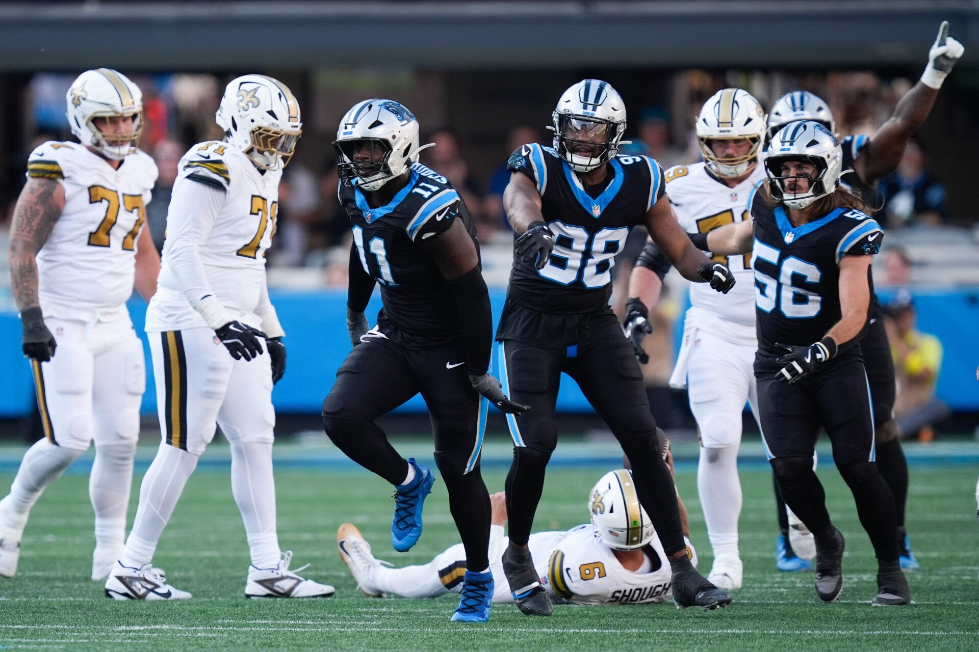 Carolina Panthers linebacker Nic Scourton (11) celebrates a sack during the fourth quarter against the New Orleans Saints at Bank of America Stadium.