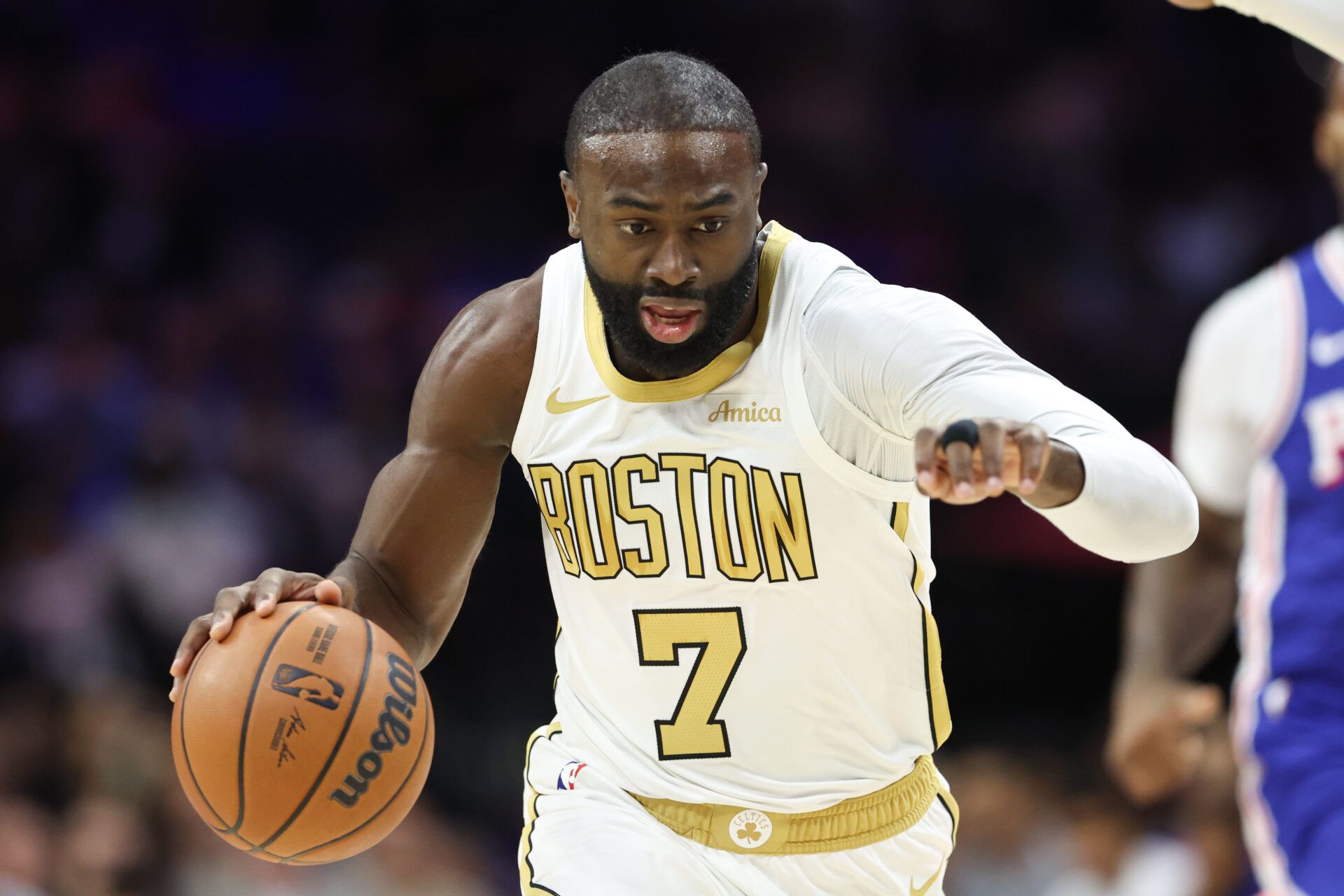 Boston Celtics guard Jaylen Brown (7) dribbles the ball against the Philadelphia 76ers during the first quarter at Xfinity Mobile Arena.