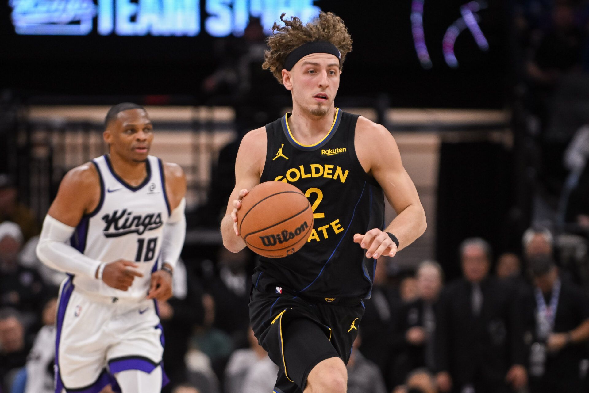 Golden State Warriors guard Brandin Podziemski (2) pushes the ball up the court during the fourth quarter of the game against the Sacramento Kings at Golden 1 Center.