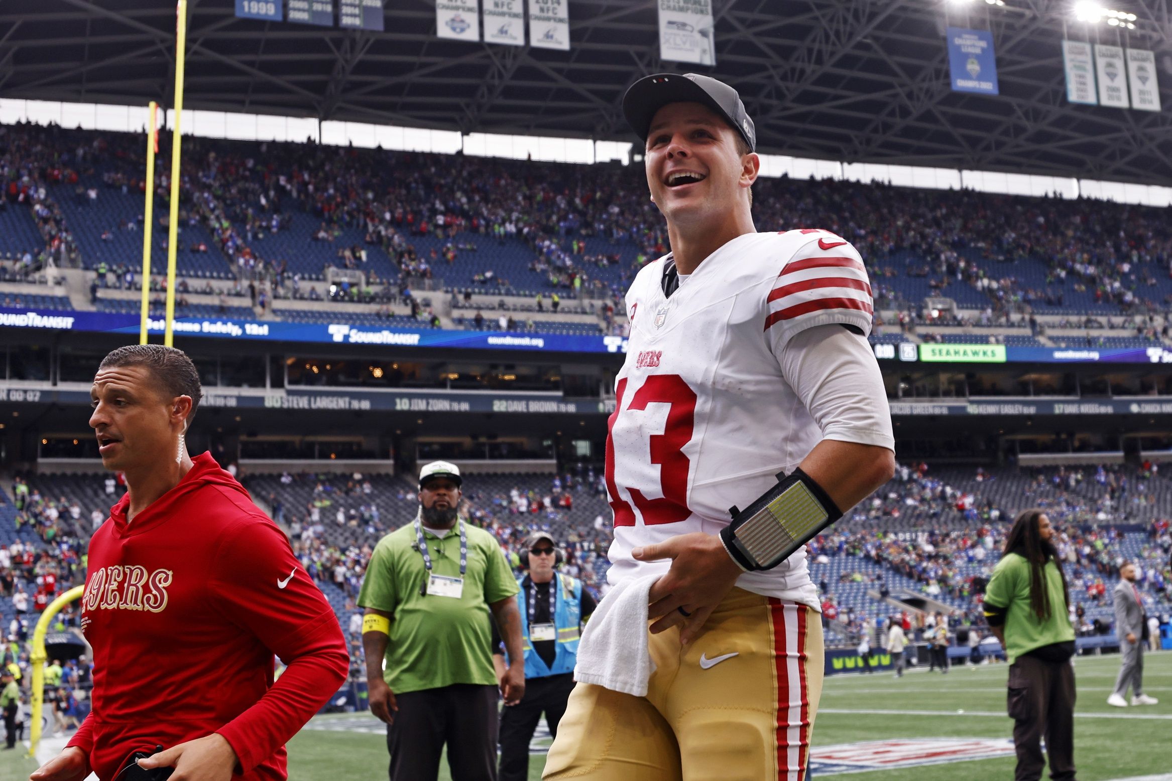 San Francisco 49ers quarterback Brock Purdy (13) reacts after the game against the Seattle Seahawks during the fourth quarter at Lumen Field.