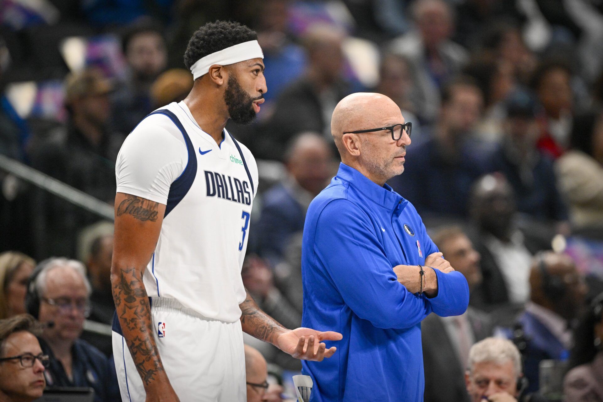 Dallas Mavericks forward Anthony Davis (3) exchanges words with Dallas Mavericks head coach Jason Kidd as Davis walks off the court during the first quarter at the American Airlines Center.