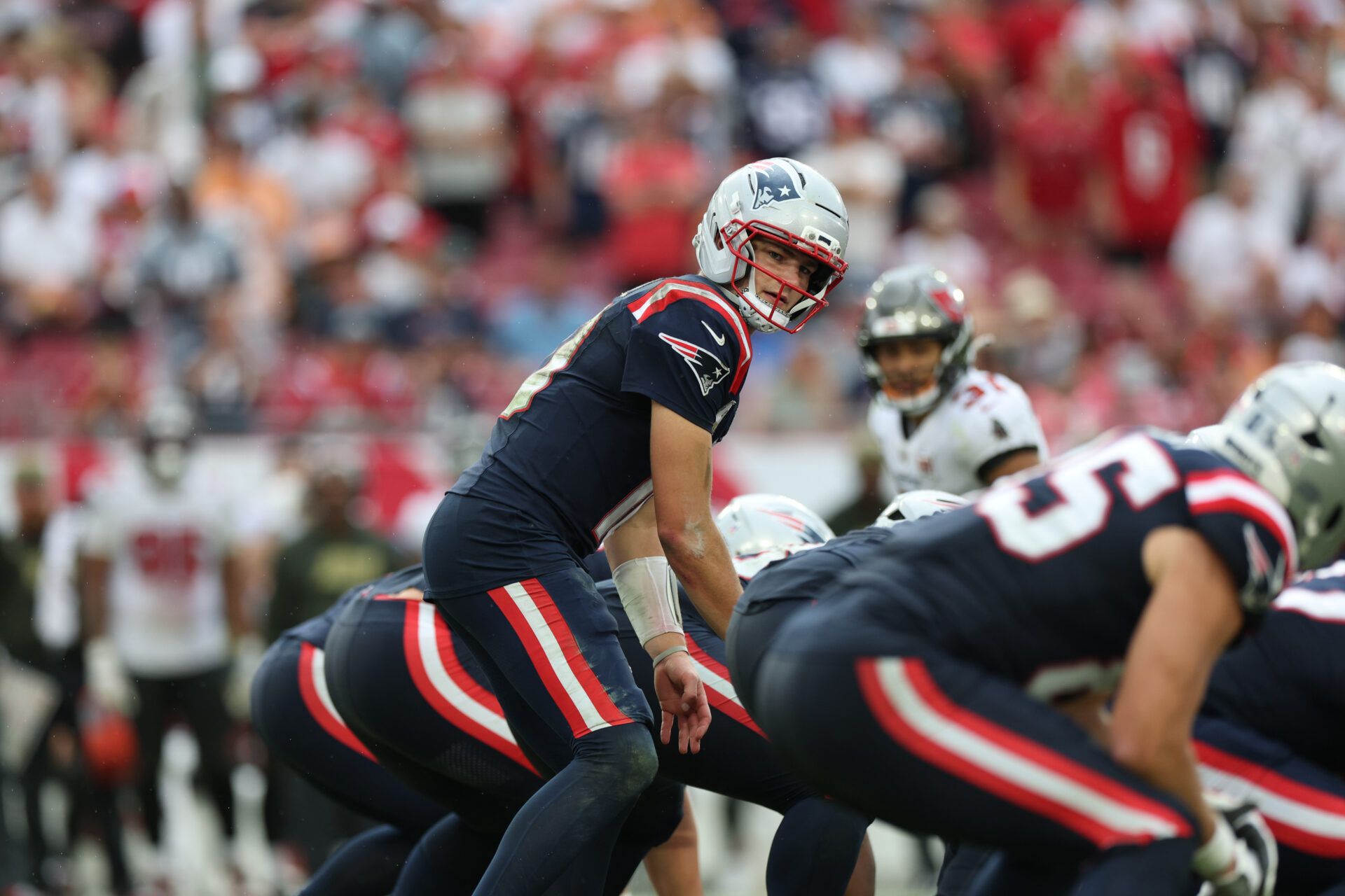 New England Patriots quarterback Drake Maye (10) under center during the fourth quarter against the Tampa Bay Buccaneers at Raymond James Stadium.