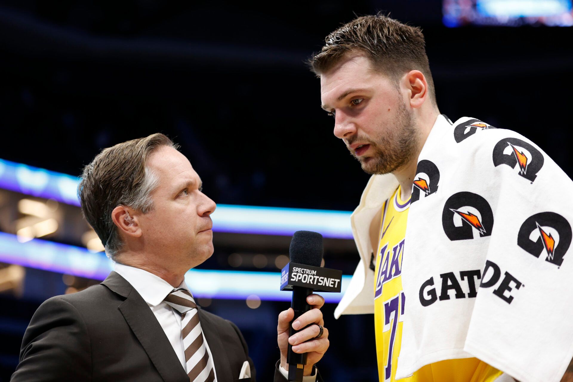 Los Angeles Lakers forward/guard Luka Doncic (77) is interviewed following the game against the Charlotte Hornets at Spectrum Center.