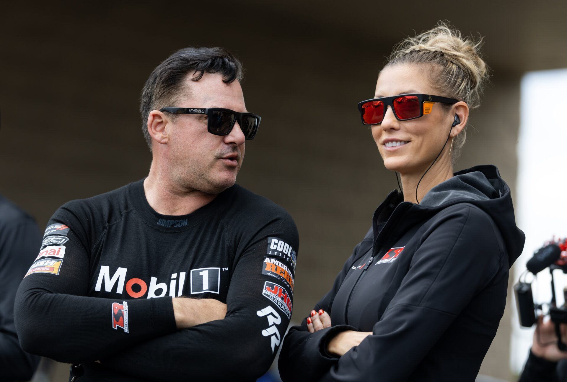 NHRA top fuel driver Tony Stewart (left) with wife Leah Pruett during the Route 66 Nationals at Route 66 Raceway.
