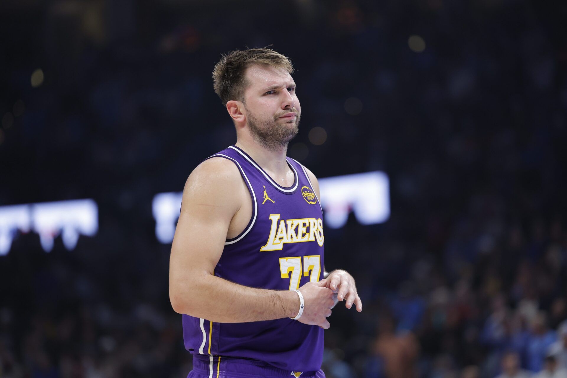 Los Angeles Lakers guard Luka Doncic reacts to a fan during the second quarter of a game against the Oklahoma City Thunder at Paycom Center.